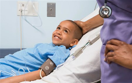 619-01432934 619-01432934
Model Release: Yes
Property Release: Yes
African boy smiling at nurse in hospital bed